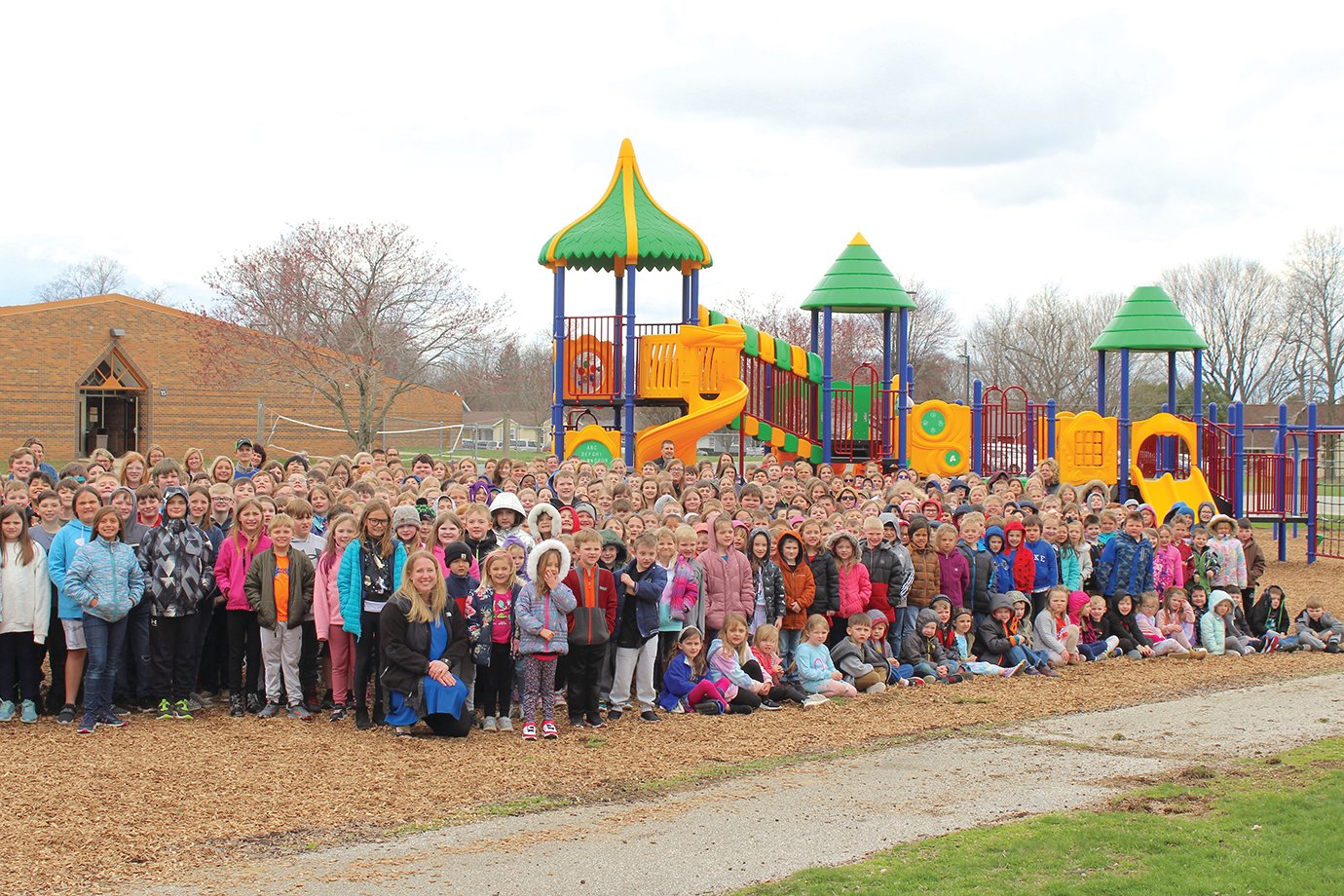 The entire student body at New Market Elementary yells “thank you” to the students, parents, teachers and sponsors who made Phase 1 possible, which saw to the installation of a new STEAM-based playground, installed earlier this week.